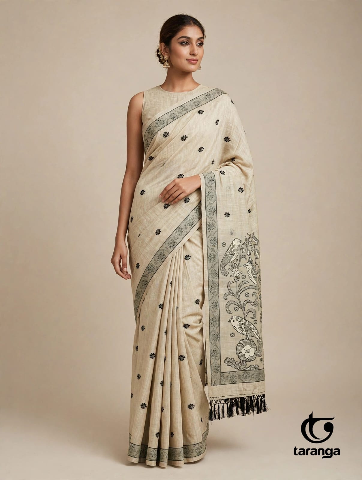 Cream saree with bird motifs